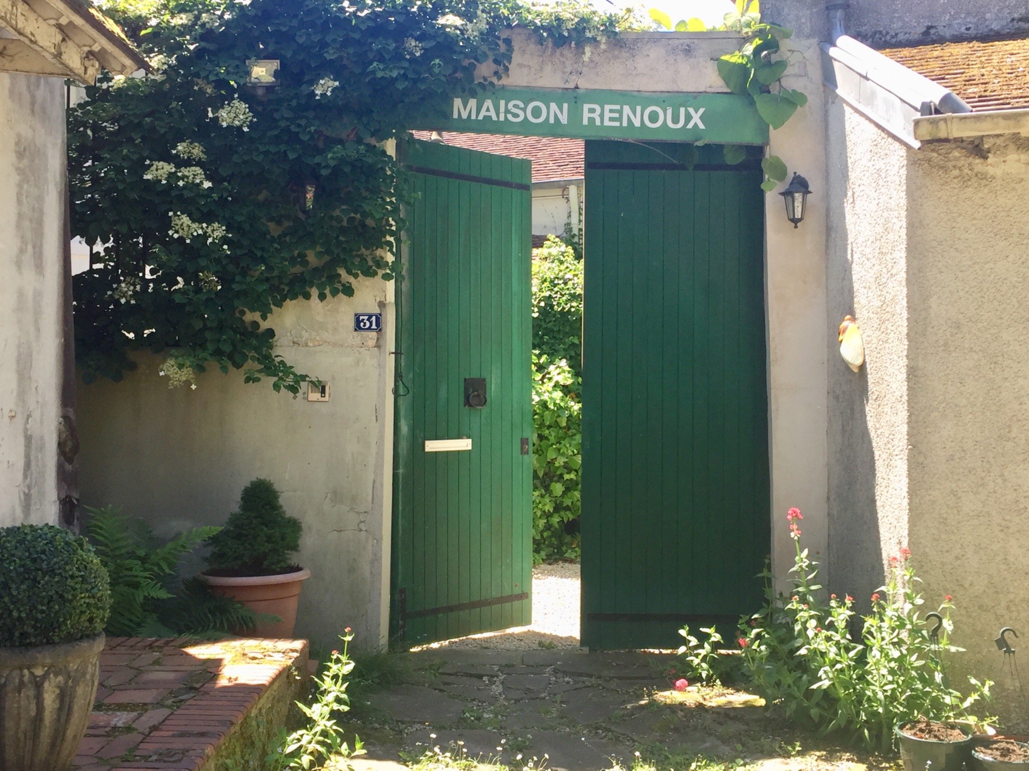 The entrance gates to Maison Renoux